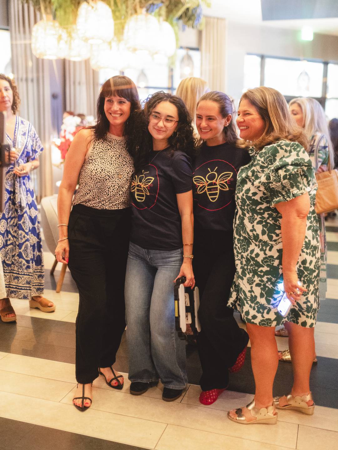 women posing for photos at Cocktails & Connections event featuring 305 Hive Media, Fem City & Luly B 
