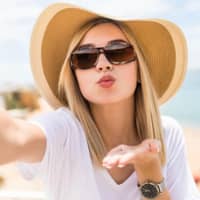 Woman wearing polarized fit-over frames