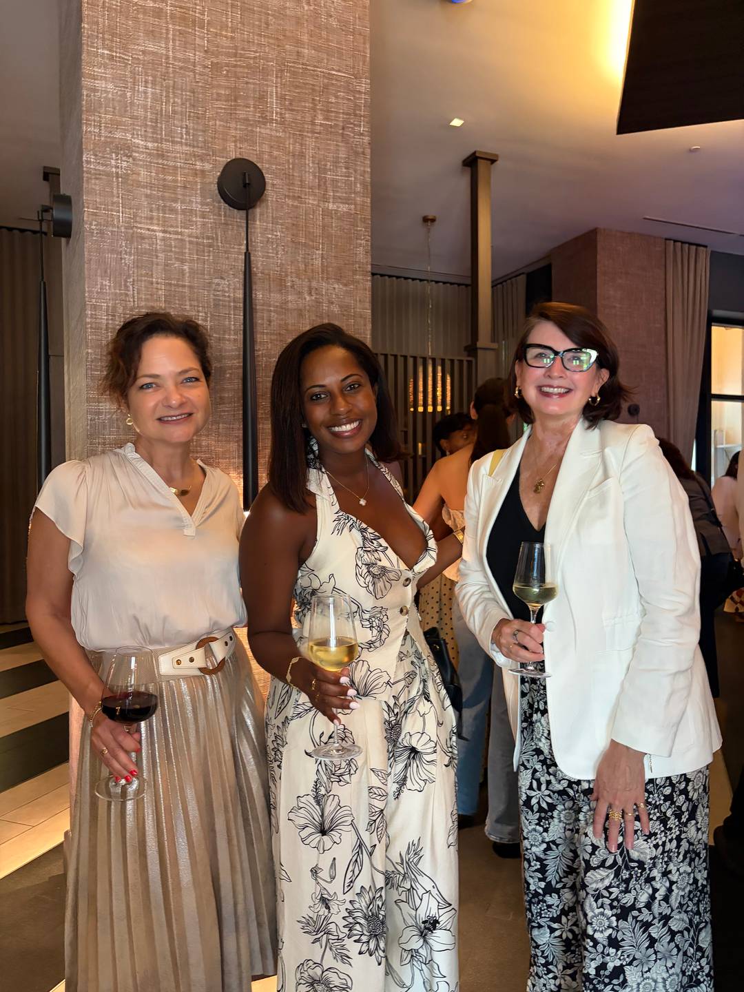 women posing for photos at Cocktails & Connections event featuring 305 Hive Media, Fem City & Luly B 
