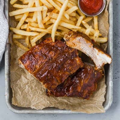 ribs on a tray with french fries
