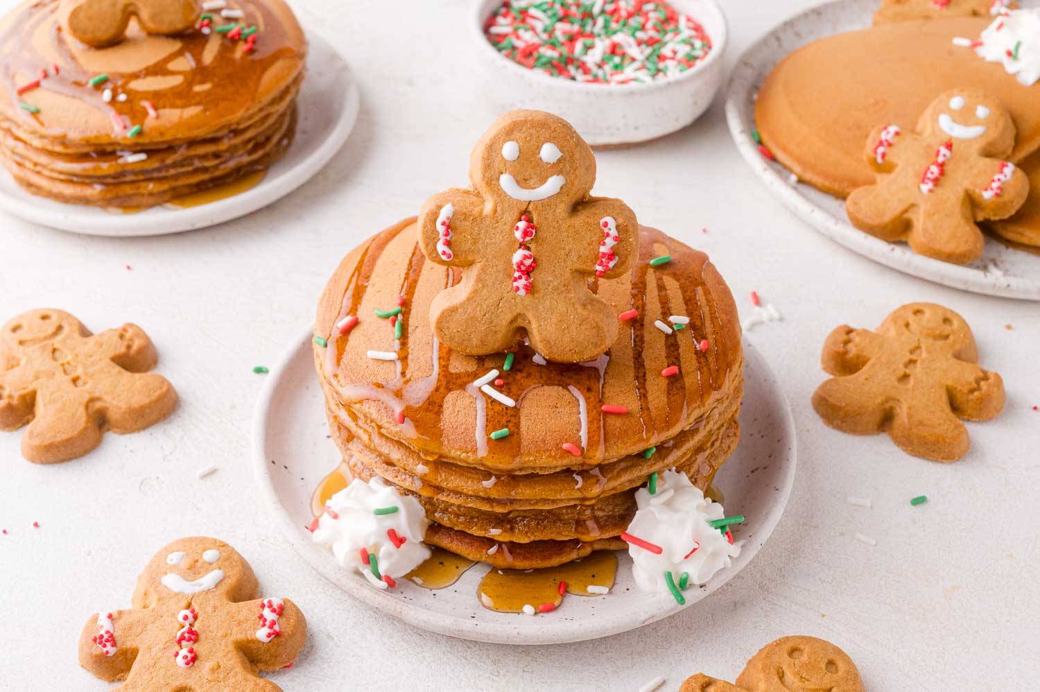 Gingerbread pancakes topped with gingerbread cookie.