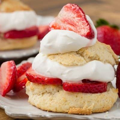Strawberry shortcake with whipped cream and fresh strawberries.