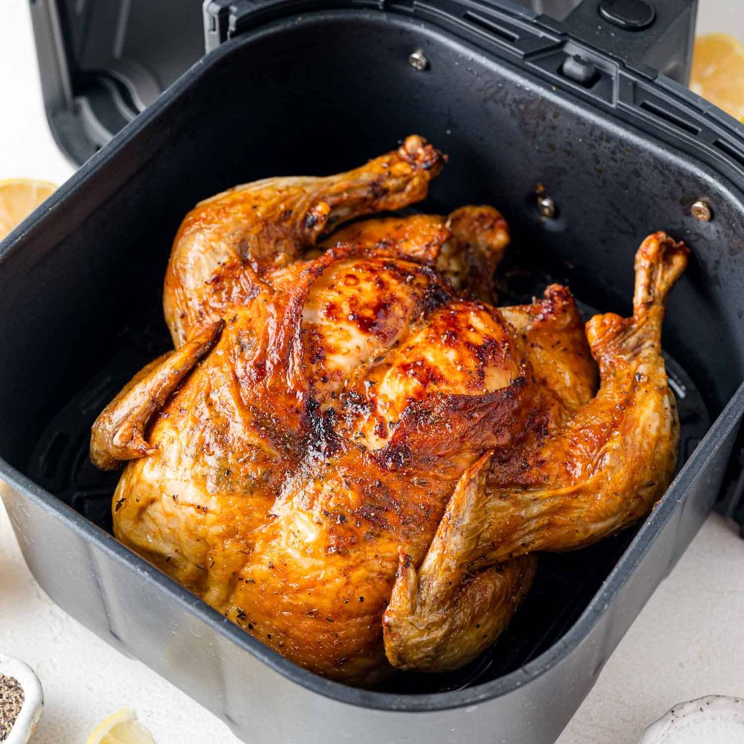 Whole chicken in an air fryer.