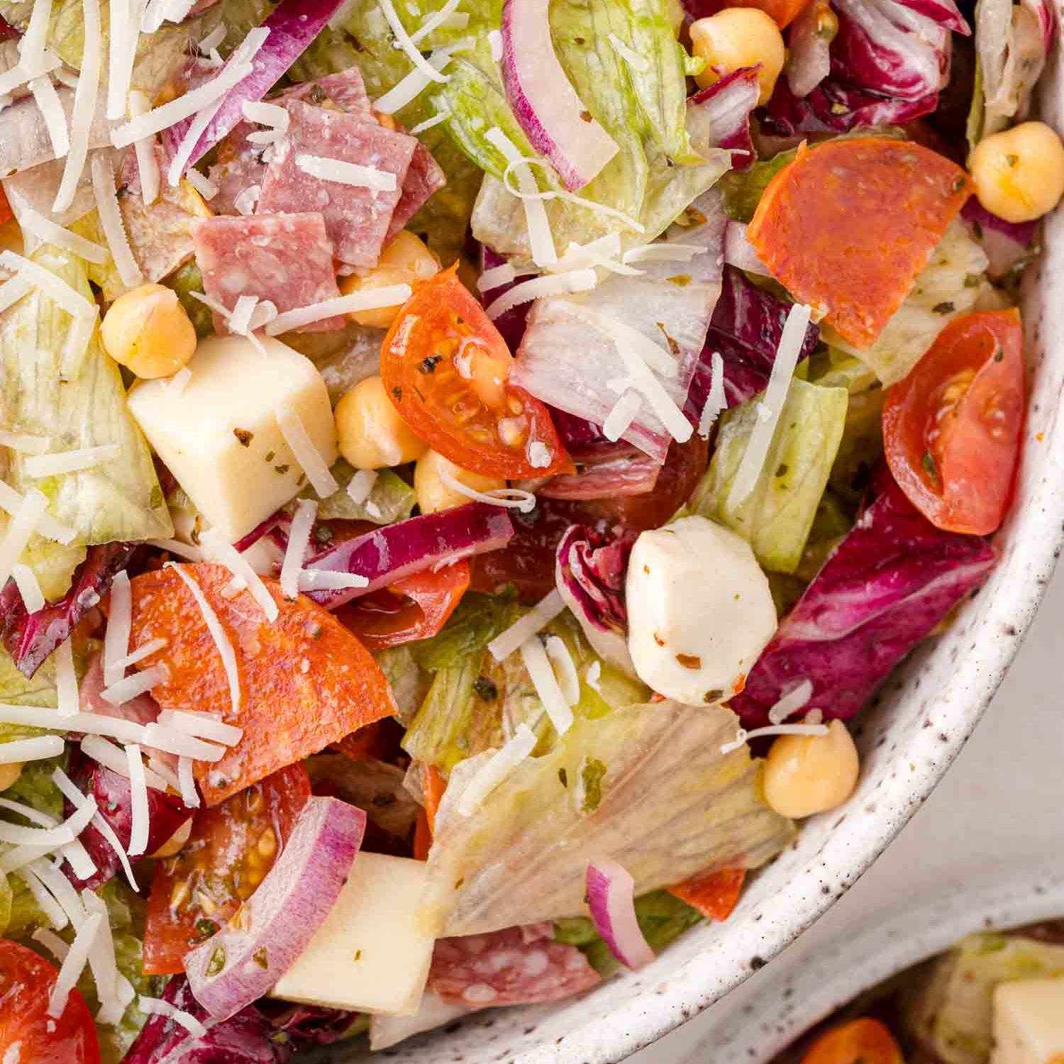 Chopped salad with mozzarella, provolone, and deli meats.