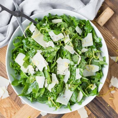 Arugula salad with cheese.