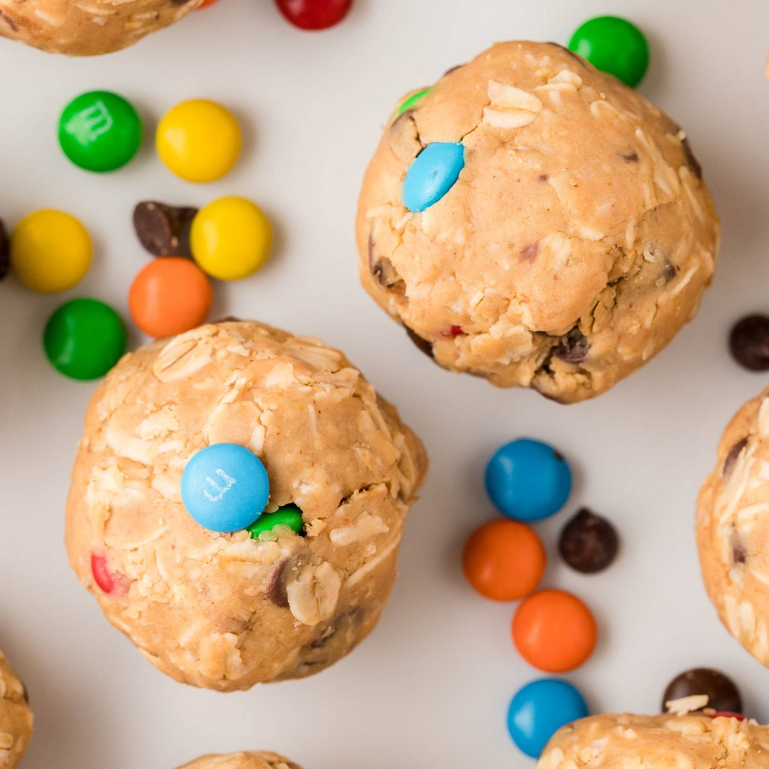 Monster cookie energy balls with mini M&Ms.