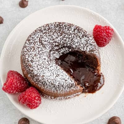 Chocolate lava cake with powdered sugar.