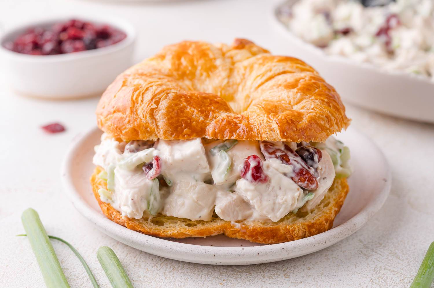 Cranberry chicken salad on a croissant.
