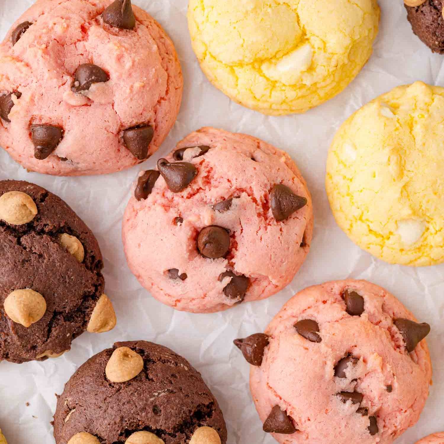 Rows of three types of cake mix cookies, chocolate, lemon, and strawberry.