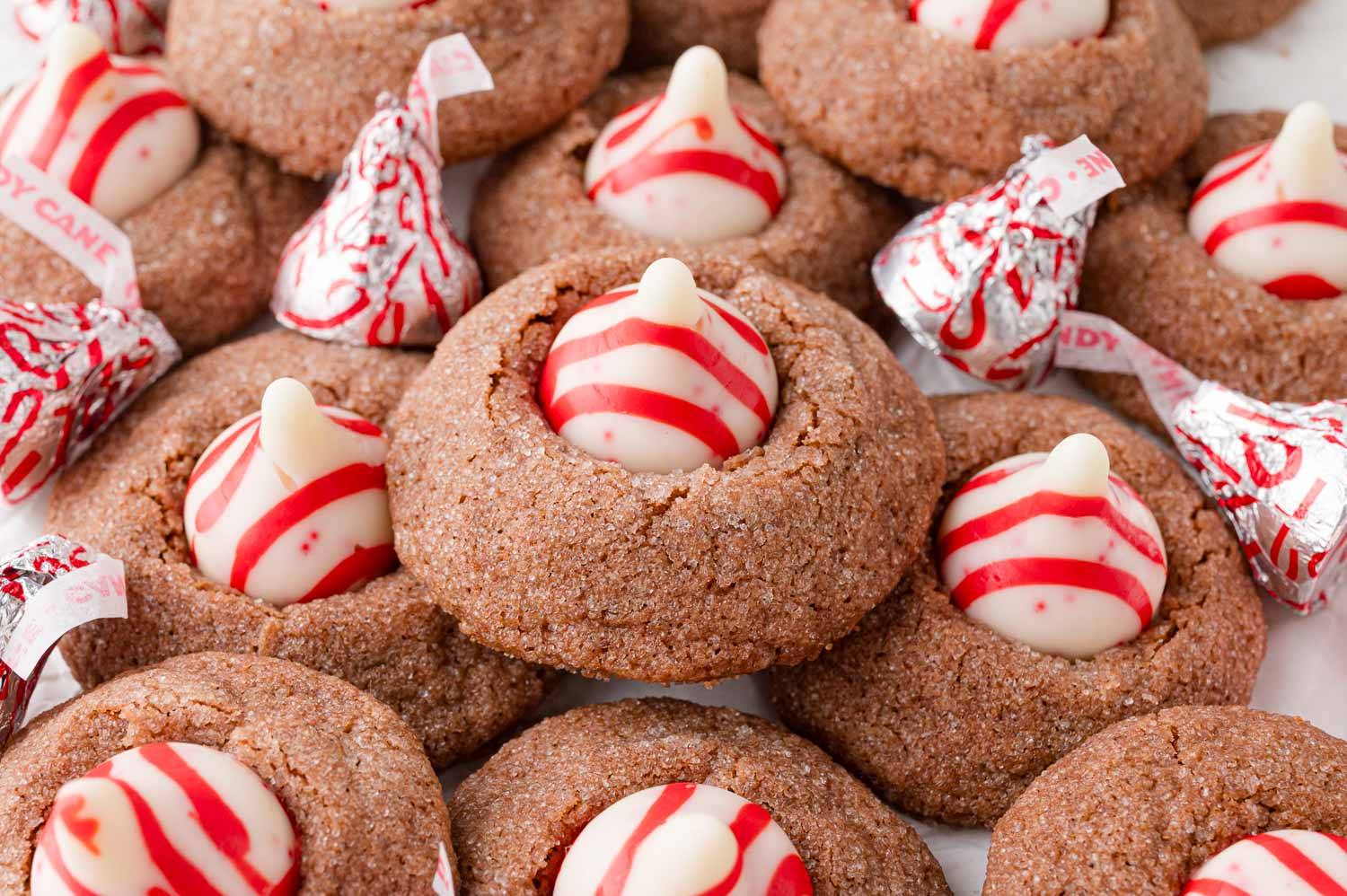 Chocolate candy cane kiss cookies piled up.