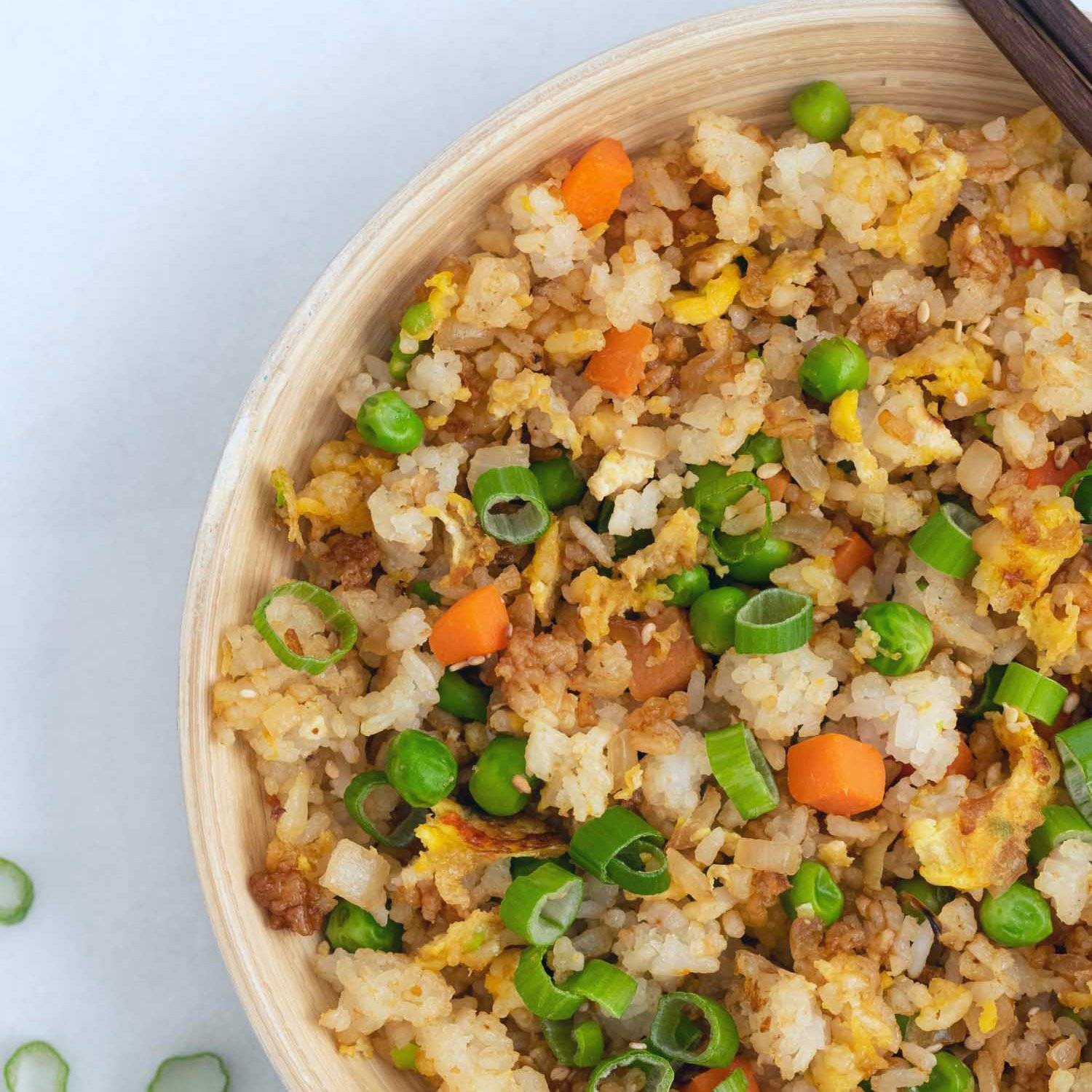 Fried rice in a white bowl.