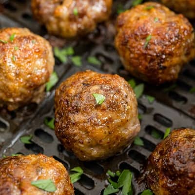 Meatballs in an air fryer.
