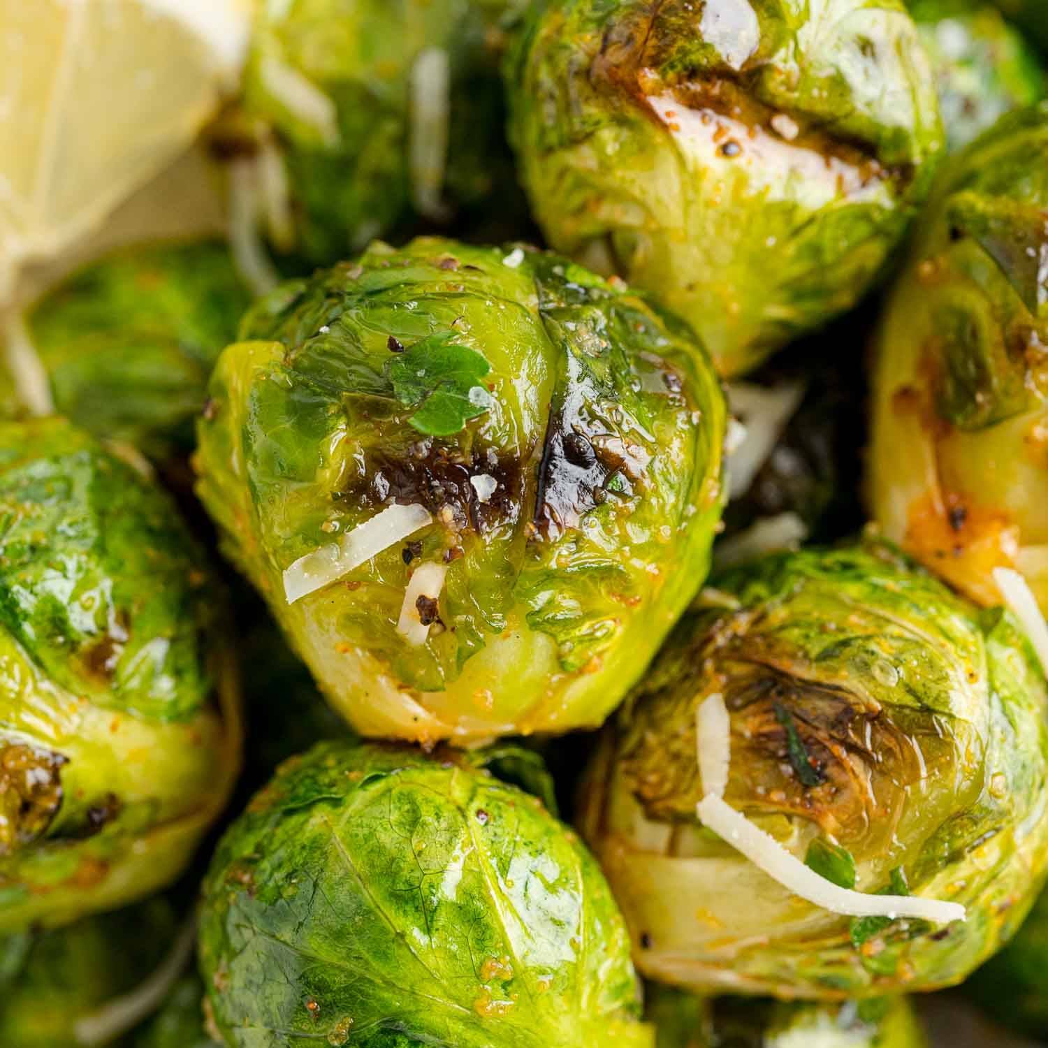 Close up of grilled Brussels sprouts.