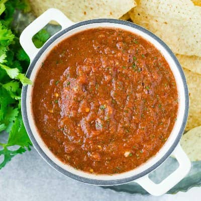 Overhead view of salsa in a white bowl.
