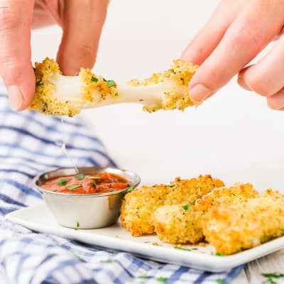 mozzarella stick being pulled apart