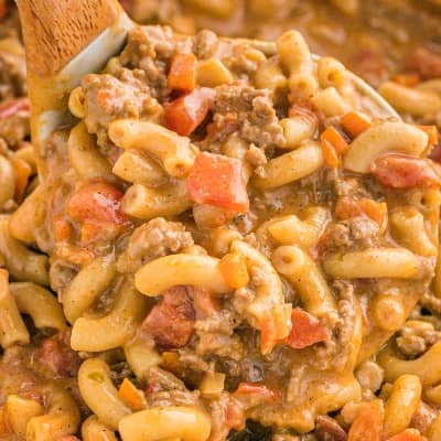Pasta with tomatoes and meat.