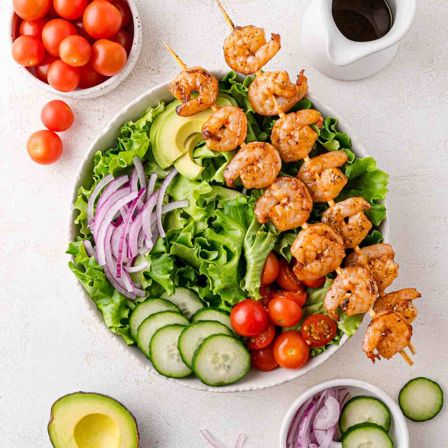 Colorful grilled shrimp salad.