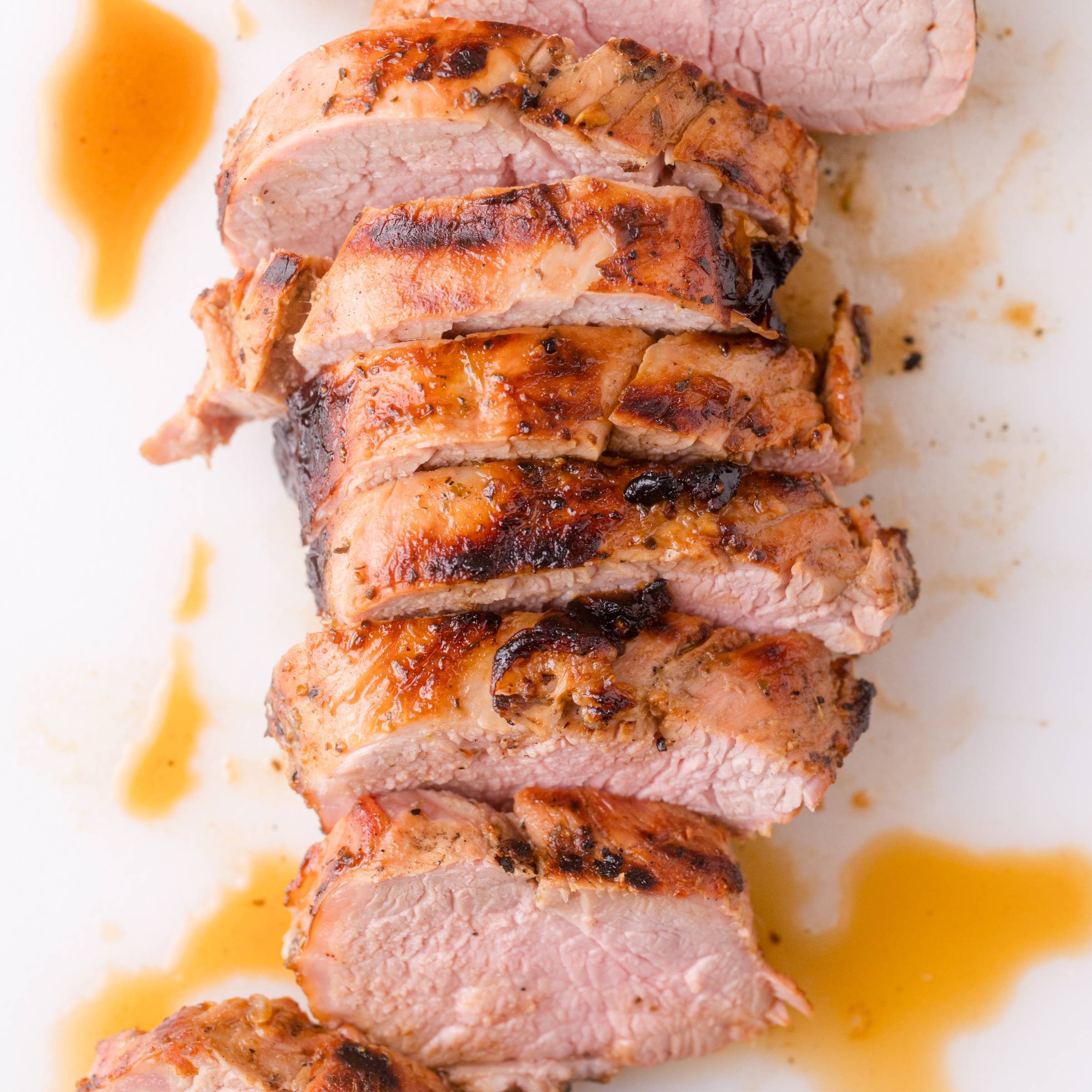 Grilled pork tenderloin, cut into slices.