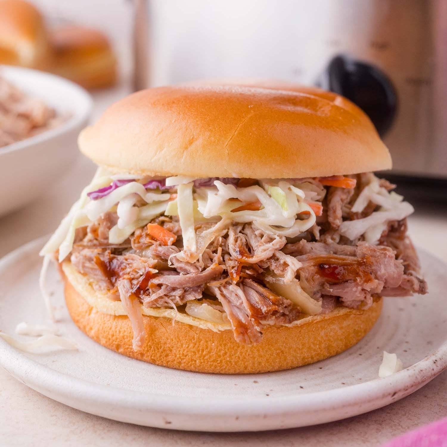 Pulled pork on a bun with coleslaw.