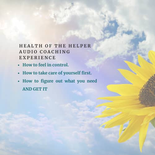 A yellow flower with drops of water on it