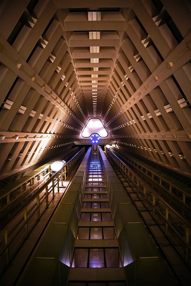 A very tall building with a very long hallway