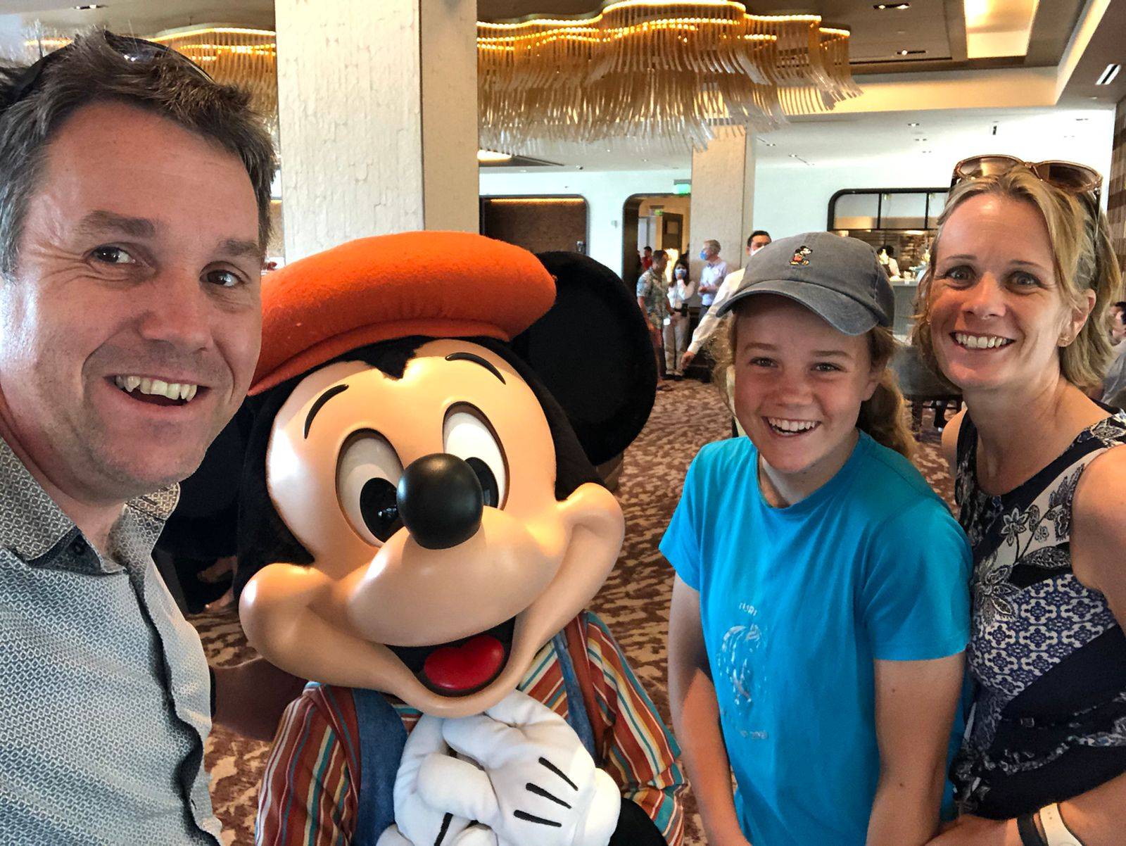 Happy family with Mickey Mouse