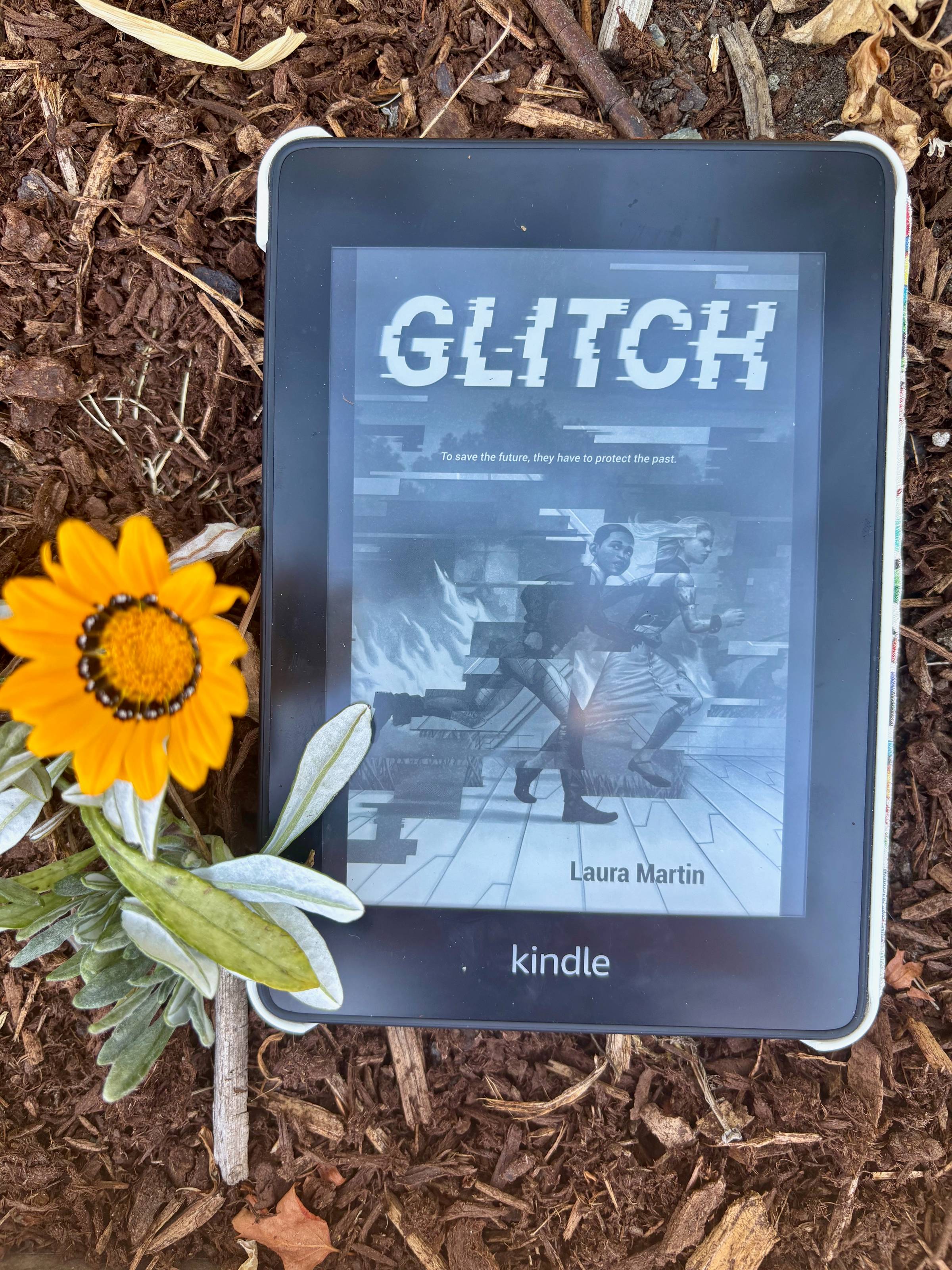 A photo of the cover of the book "Glitch" by Laura Martin. 