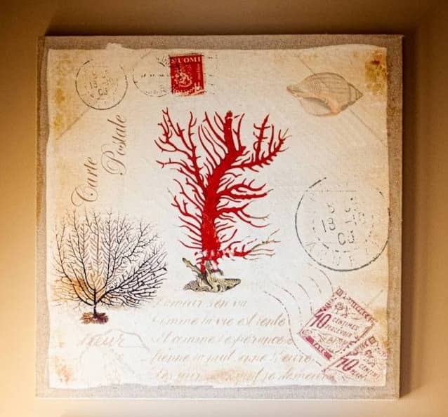 Two framed artworks featuring red coral designs.