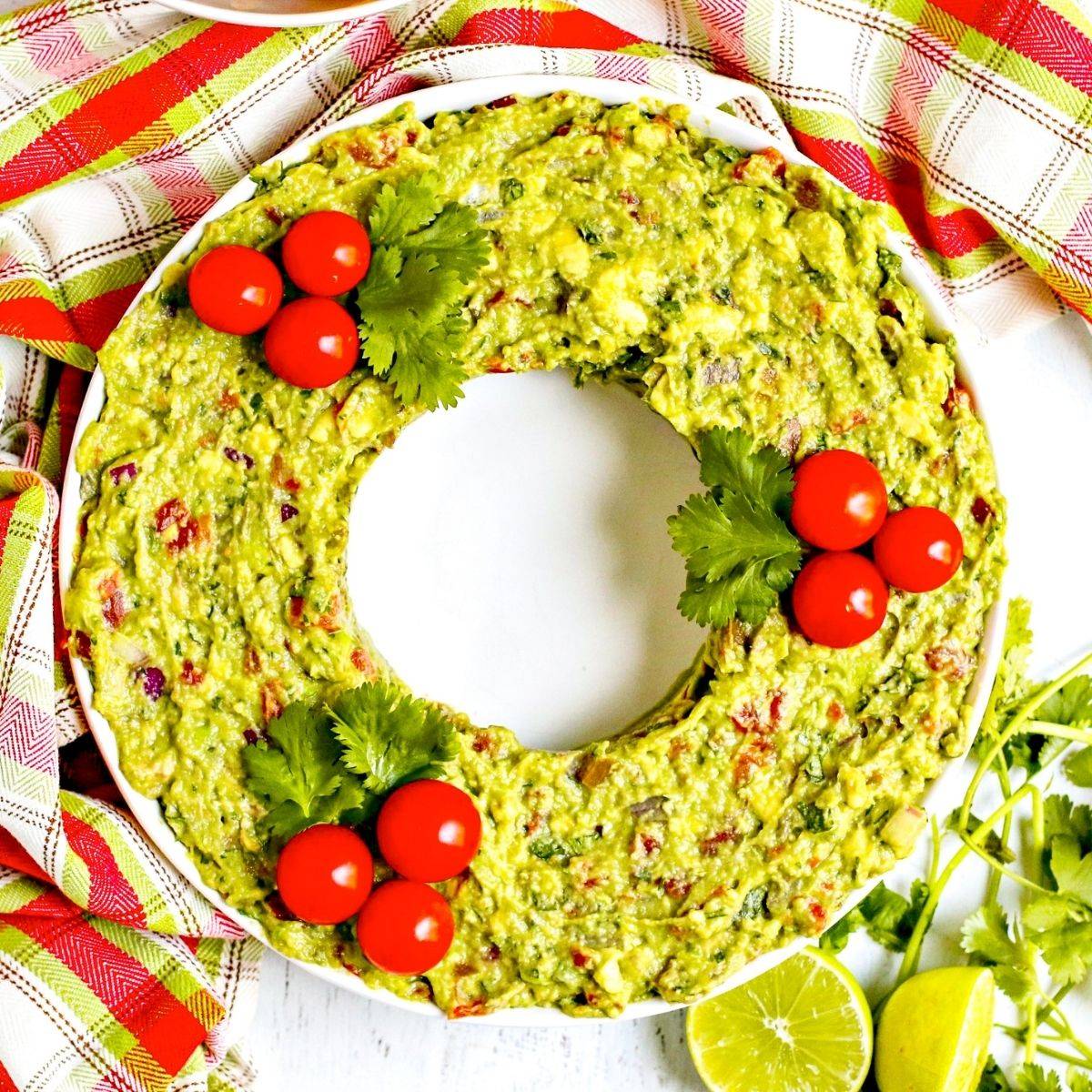 Guacamole in the shape of a Christmas wreath.