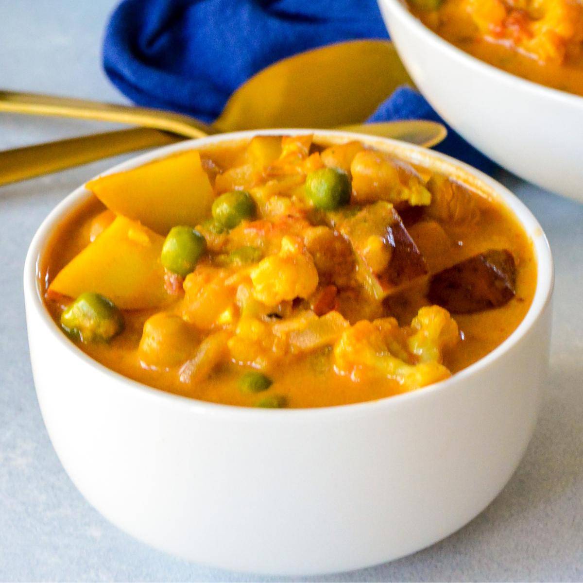 Bowl of vegan cauliflower chickpea curry.