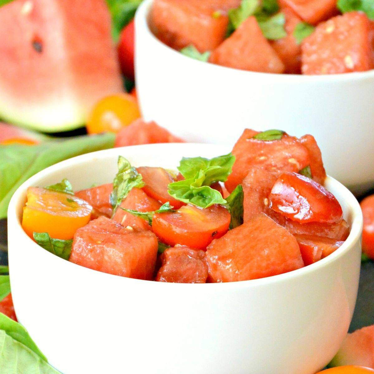 Bowl of watermelon tomato basil salad.