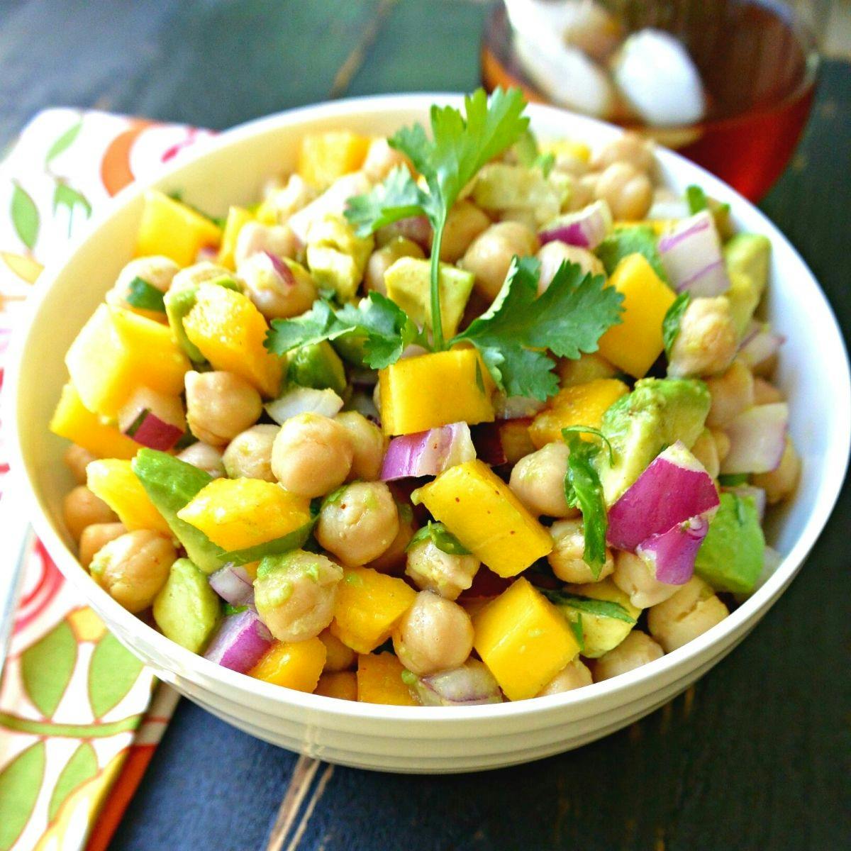 Bowl of mango chickpea salad.