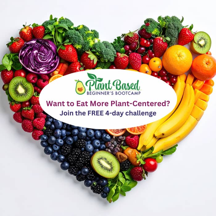 Fruits and vegetables in the shape of a heart with text overlay: Want to Eat More Plant Centered? Joined the FREE 4-day challenge.