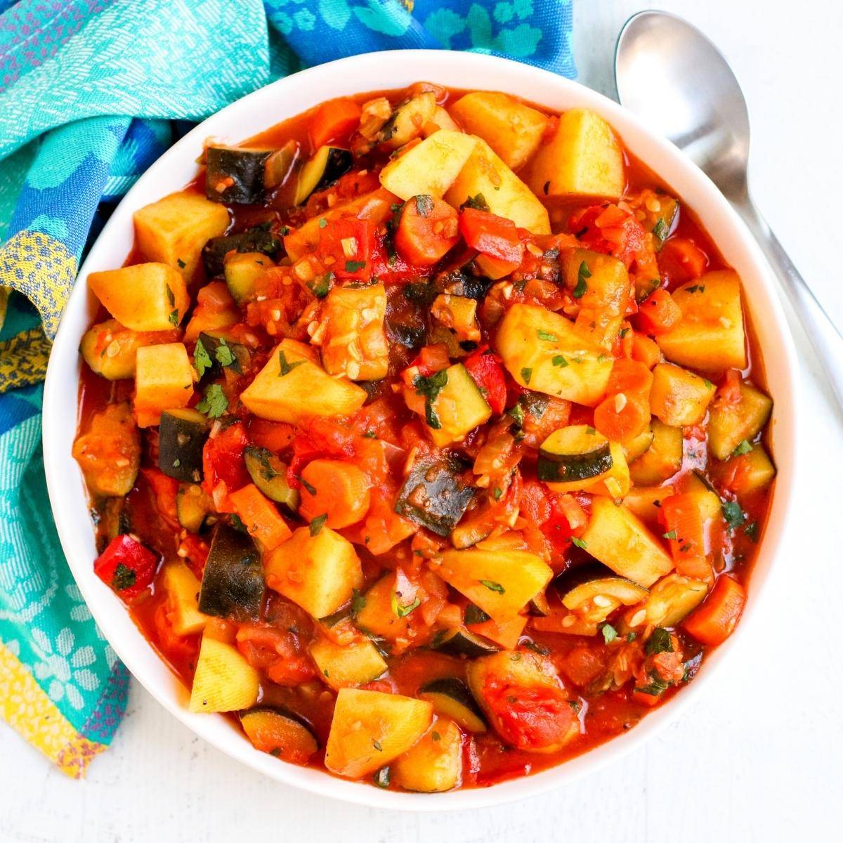 Bowl of zucchini and potato veggie stew.