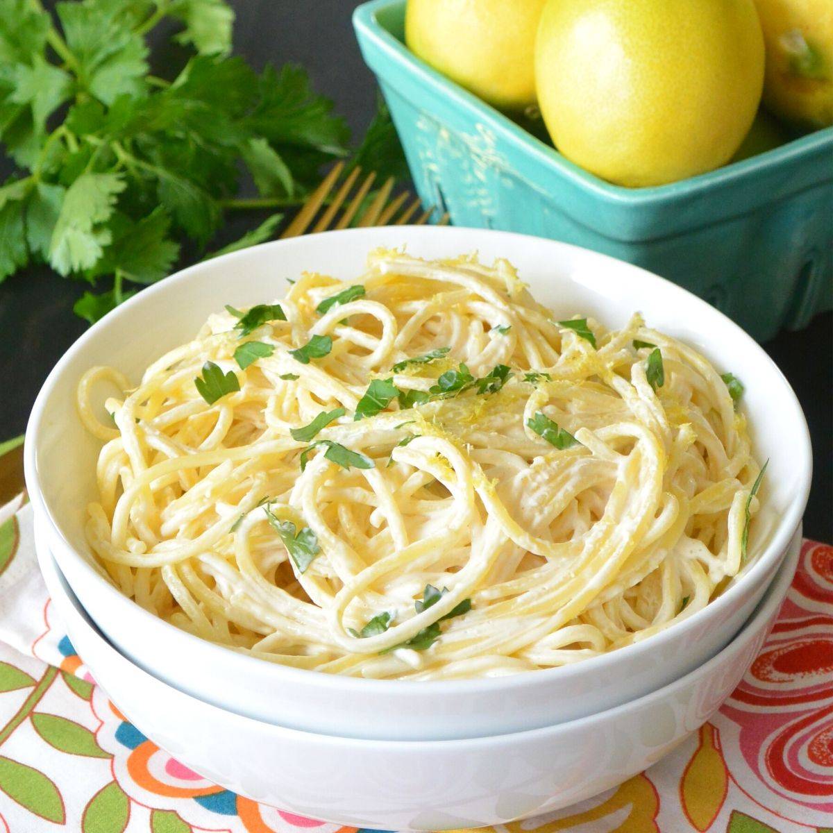 Bowl of spaghetti with creamy sauce.