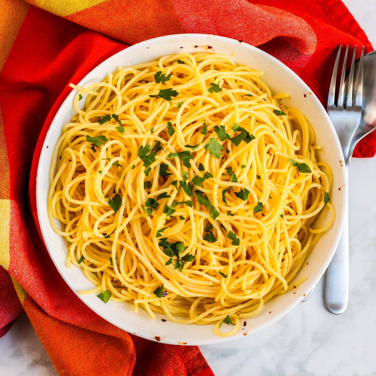 Bowl of spaghetti and a fork.