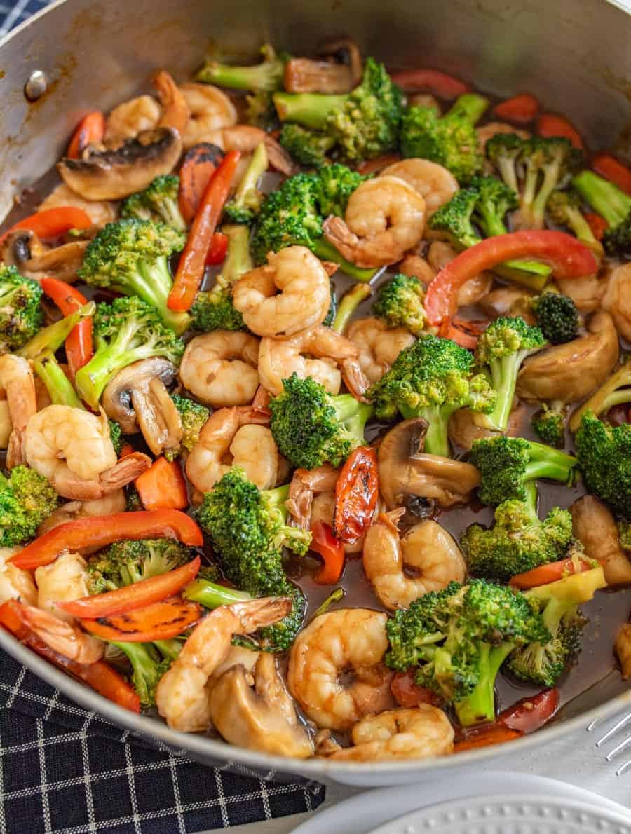 shrimp stir fry in skillet.