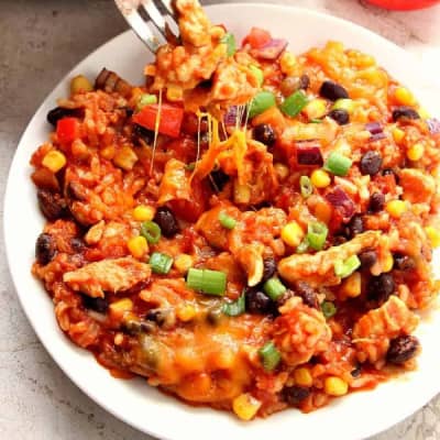 Mexican rice casserole on a white plate.