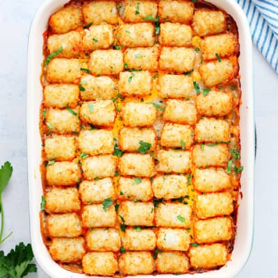 Tater tot casserole in a rectangular baking dish.