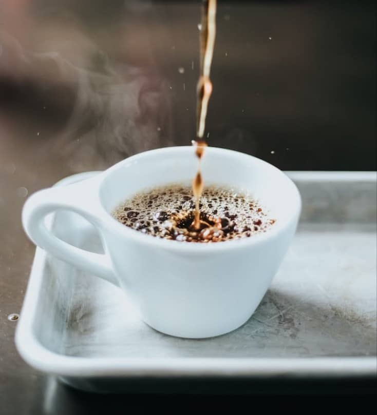 time lapse photography of coffee on cup