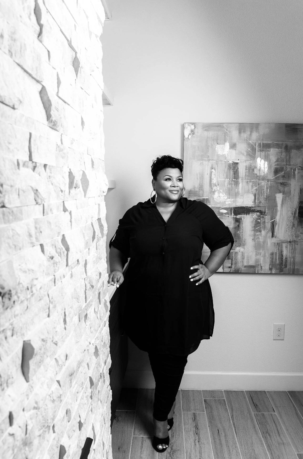 Black and white portrait of Nicole Mickle, Orlando relocation and new construction specialist