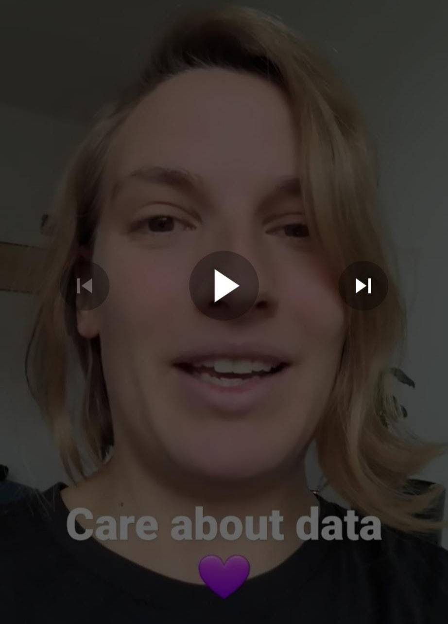 Heidi's face behind a play button