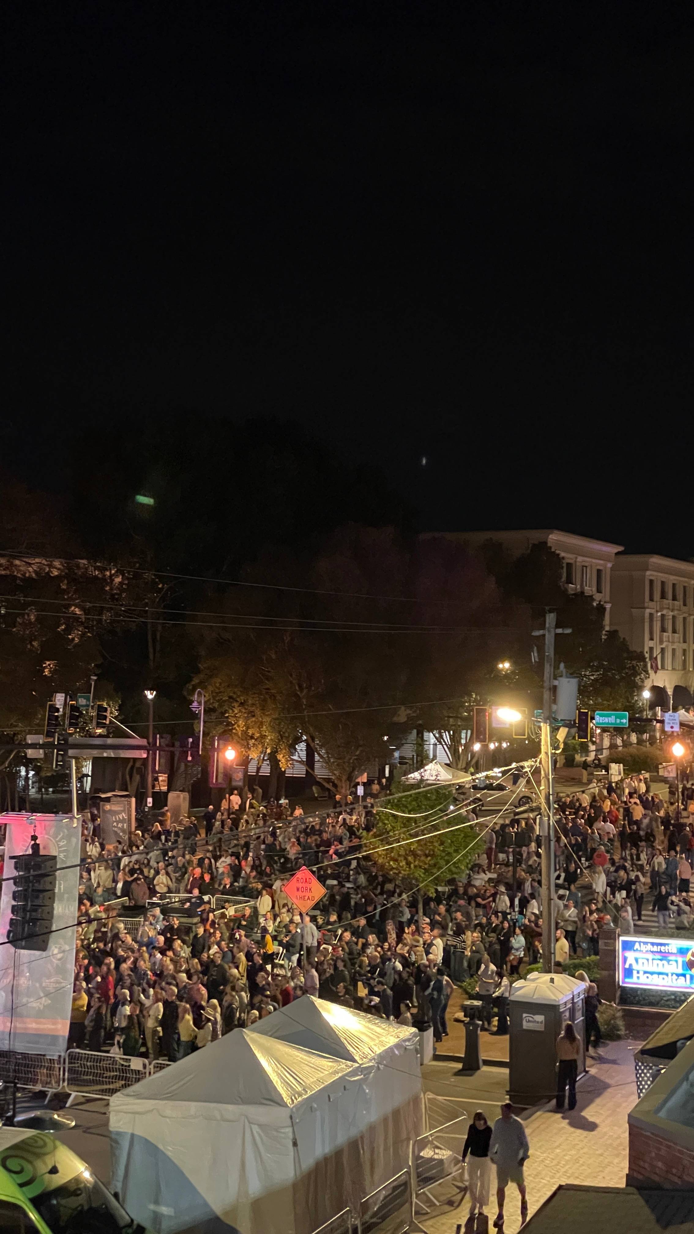 A night scene of Downtown Alpharetta crowd at the main stage of the Songwriters Festival