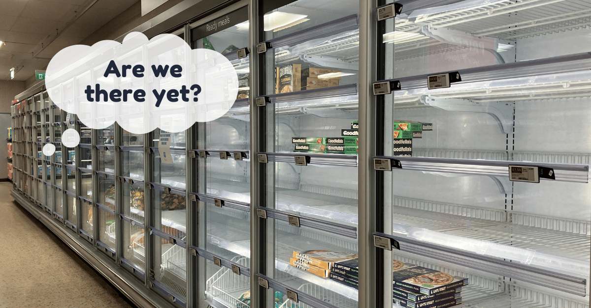 A wide angle view of the frozen food aisle at the Waterloo, Liverpool Co-op. The shelves are about 15% full.