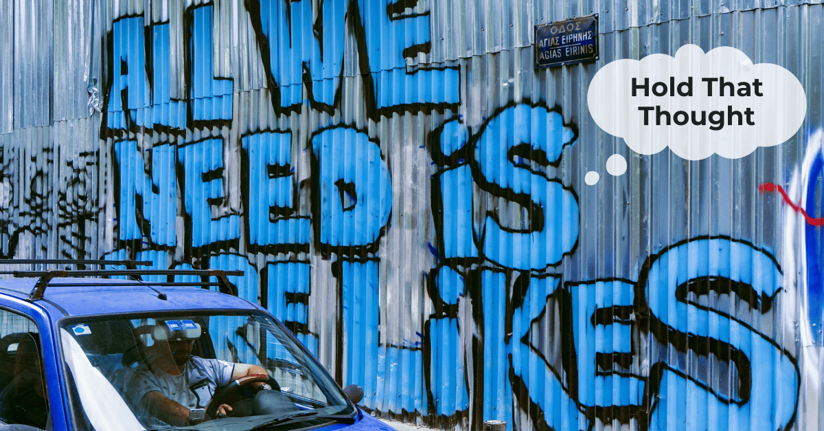 Corrugated iron wall with graffiti: All we need is more likes.