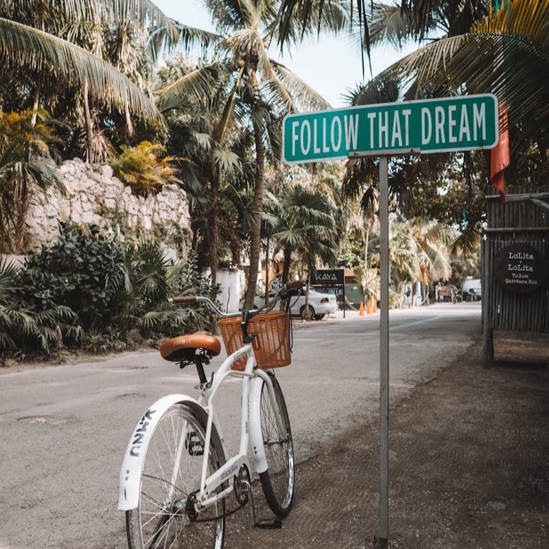 parked white bicycle