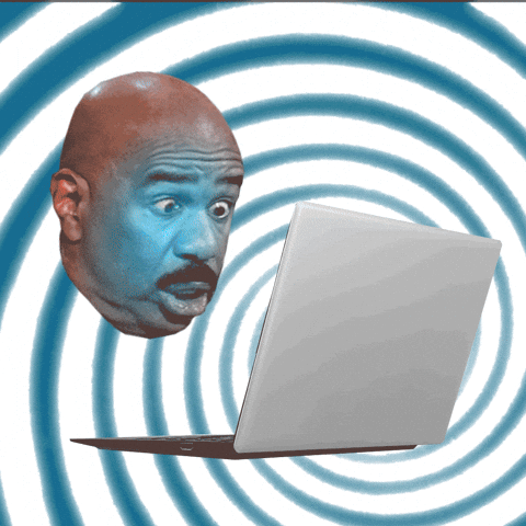 gif of steve harvey in a trance with a spiral behind his floating head, he is cross-eyed looking at a laptop with email notifications popping up all over the place