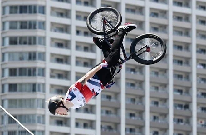 women flipping on bmx 