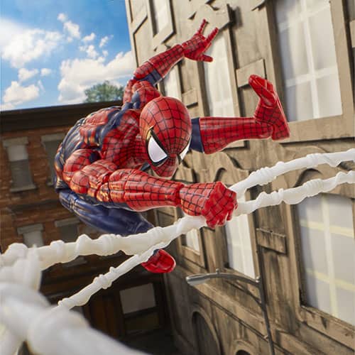 Marvel Legends' Maximum Spider-Man swinging through NYC with a cloudy, blue sky in the background