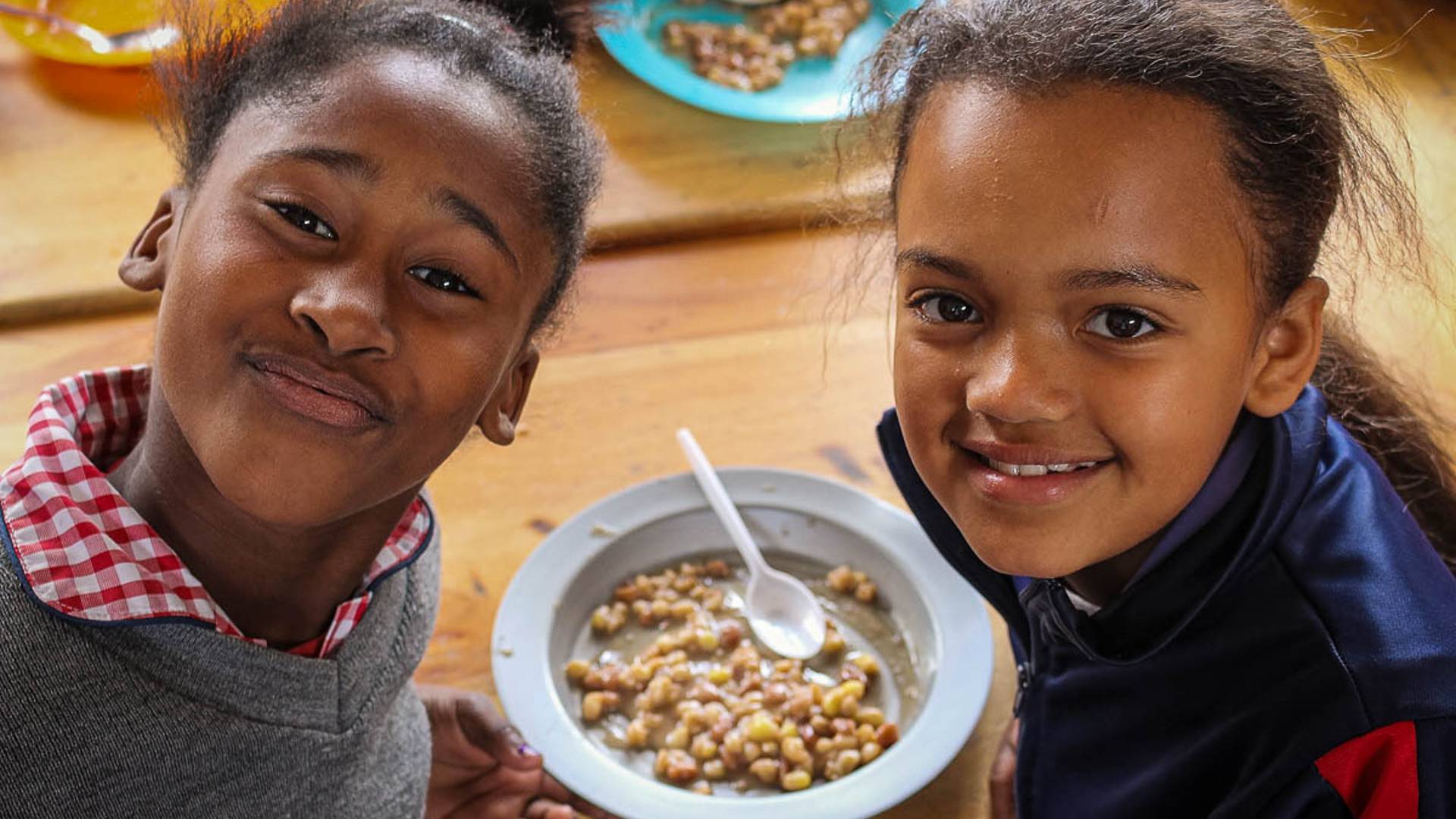 Happy  children feeding